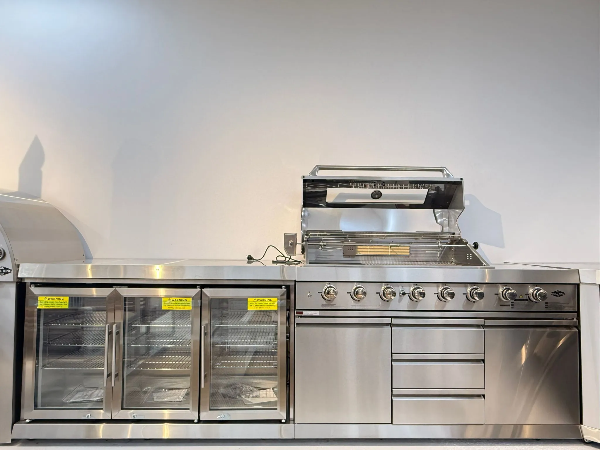L Shape 304SS Hurricane BBQ Inc 3DR Fridge, 118L Fridge,30” Pizza Oven, 150CM 304SS Rangehood, Rotisserie & Covers